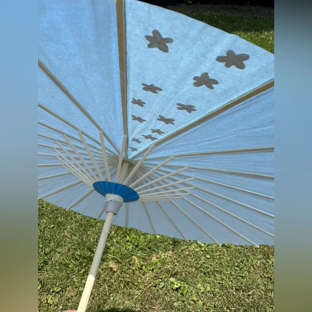 Blue Paper Parasol with White Flower Design
